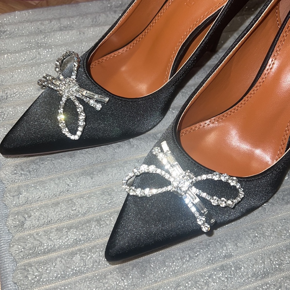 Satin black pumps